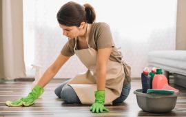 65d5b19950d874f282b5c35f_woman-with-gloves-cleaning-floor_23-2148520978